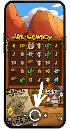 Le Cowboy-spilgrænseflade med den runde spin-knap fremhævet til start af spillet