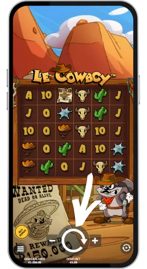 Le Cowboy -pelin näkymä, jossa pyöreä spin-painike on korostettu pelin käynnistämistä varten suomalaisille pelaajille